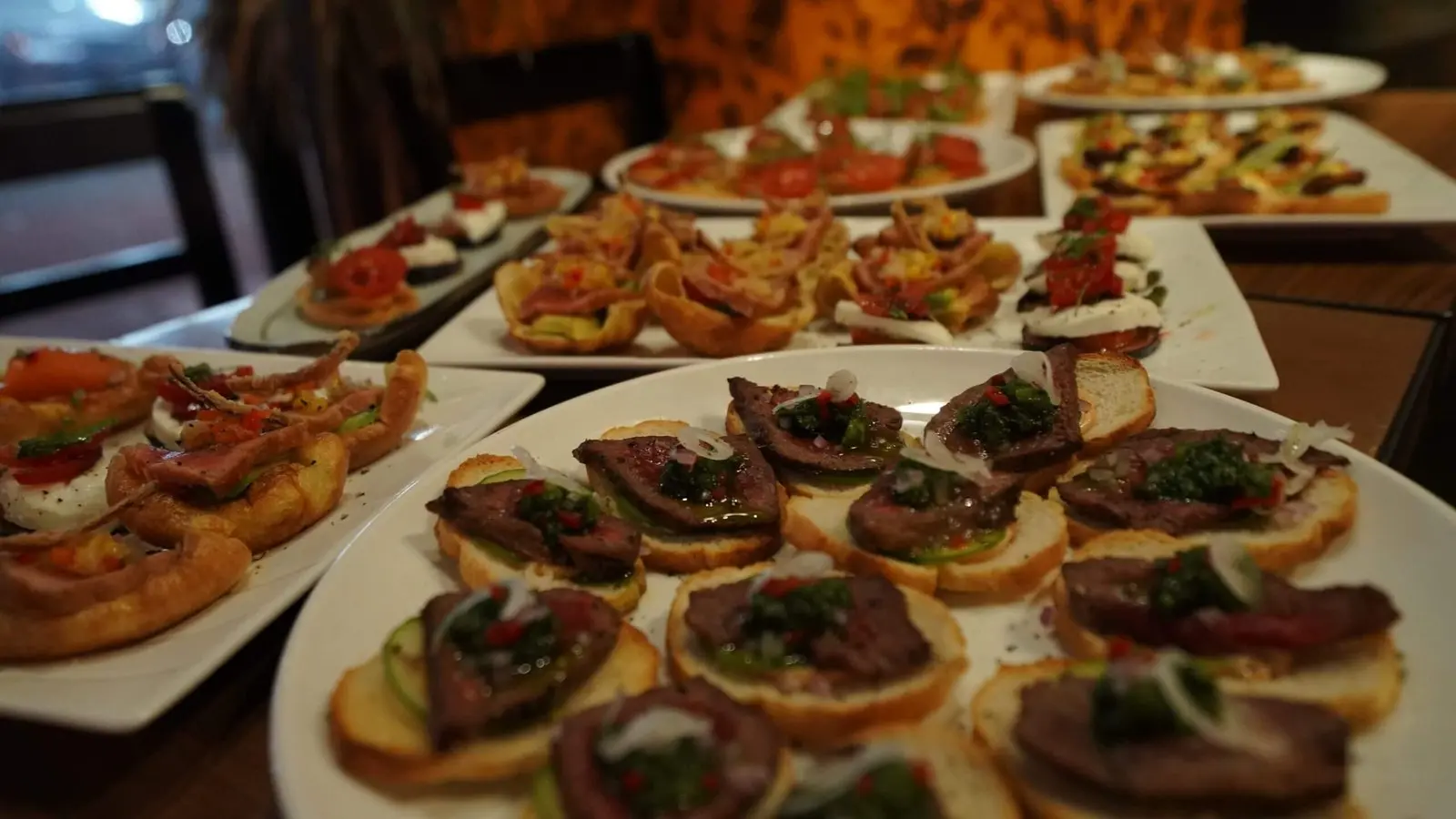 A spread of small plates at The Den